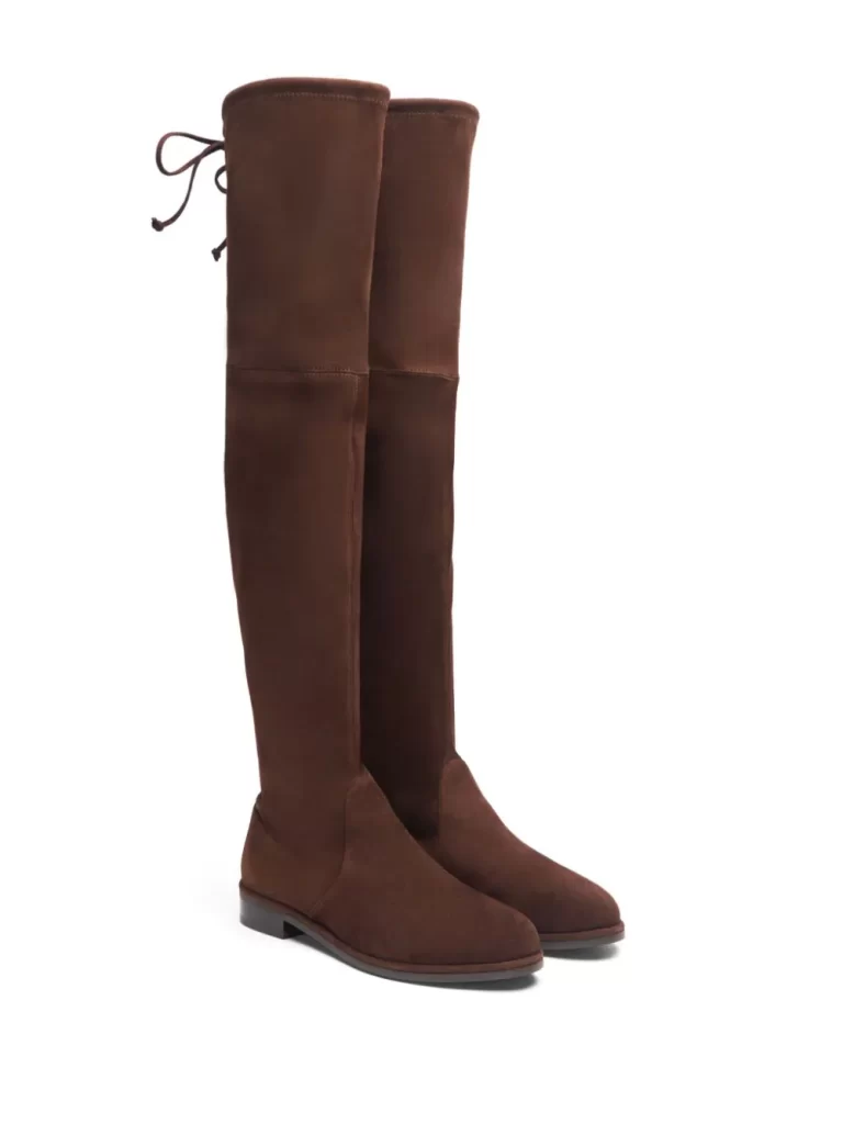 Brown over the knee boots.