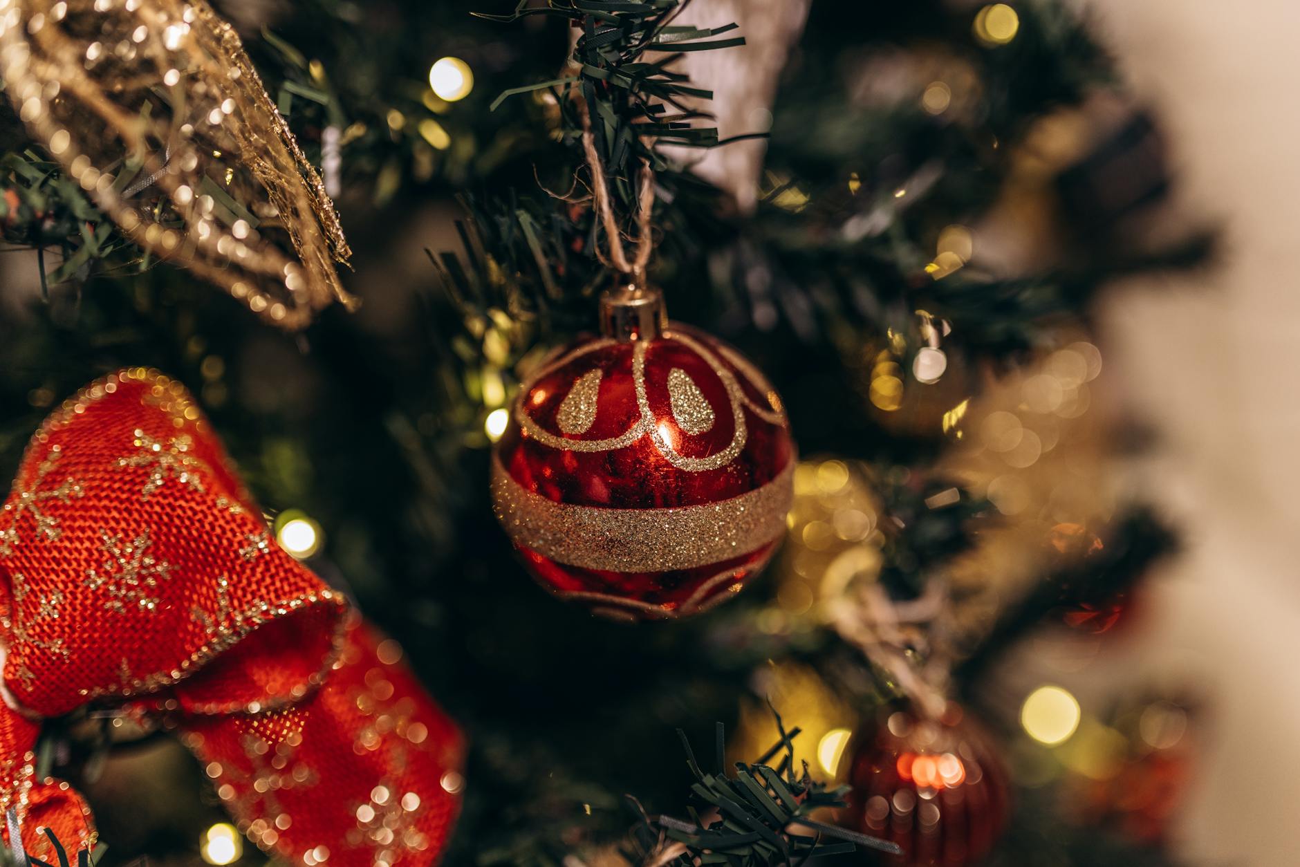 red bauble on christmas tree