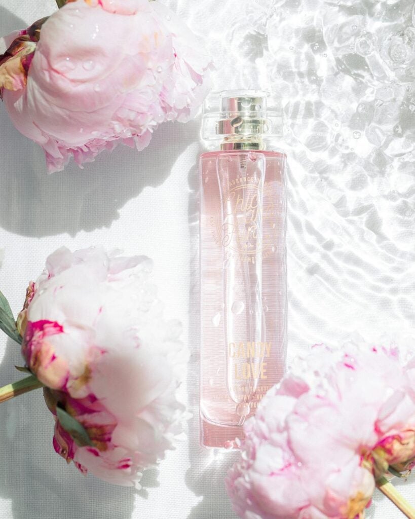 a close up shot of a bottled perfume