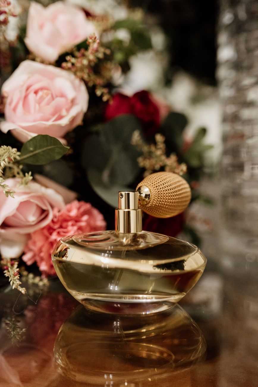 a close up shot of a perfume bottle